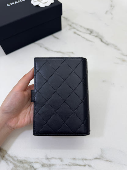 CHANEL 25K Passport Holder So Black