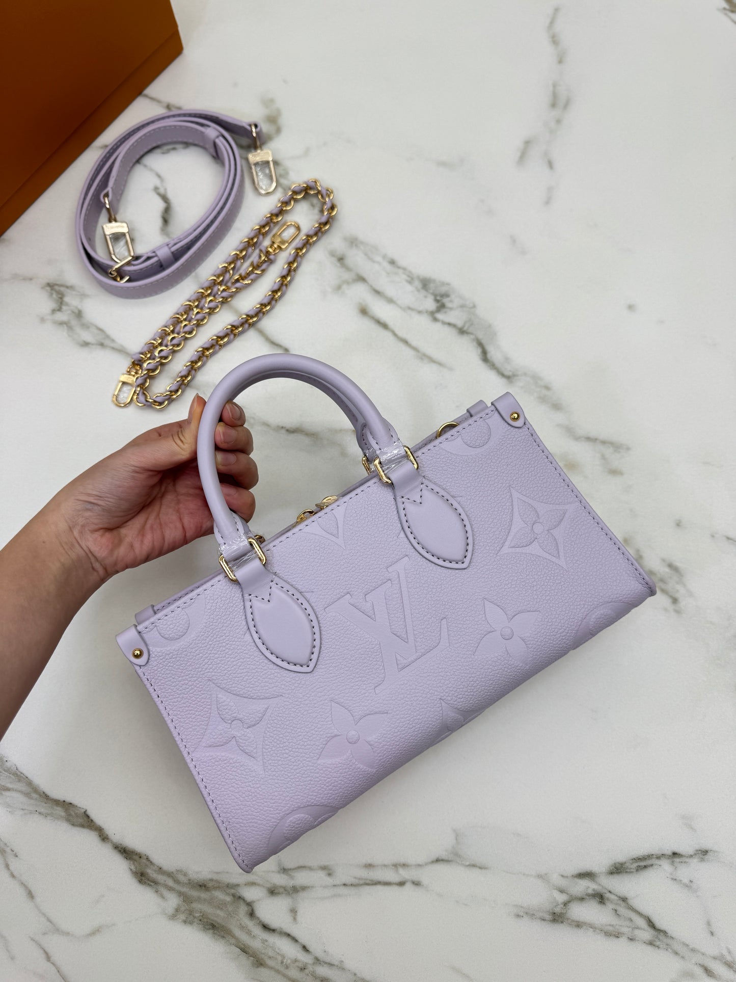 LV On the Go East-west 淺紫